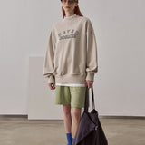 Small Fit Never Cosmic Sweatshirt / Beige