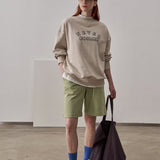 Small Fit Never Cosmic Sweatshirt / Beige
